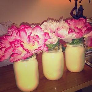 3 yellow mason jars with peony flowers